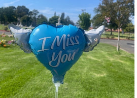 I Miss You Memorial Balloon on a Stick – Heart Shaped with Angel Wings Graveside Tribute