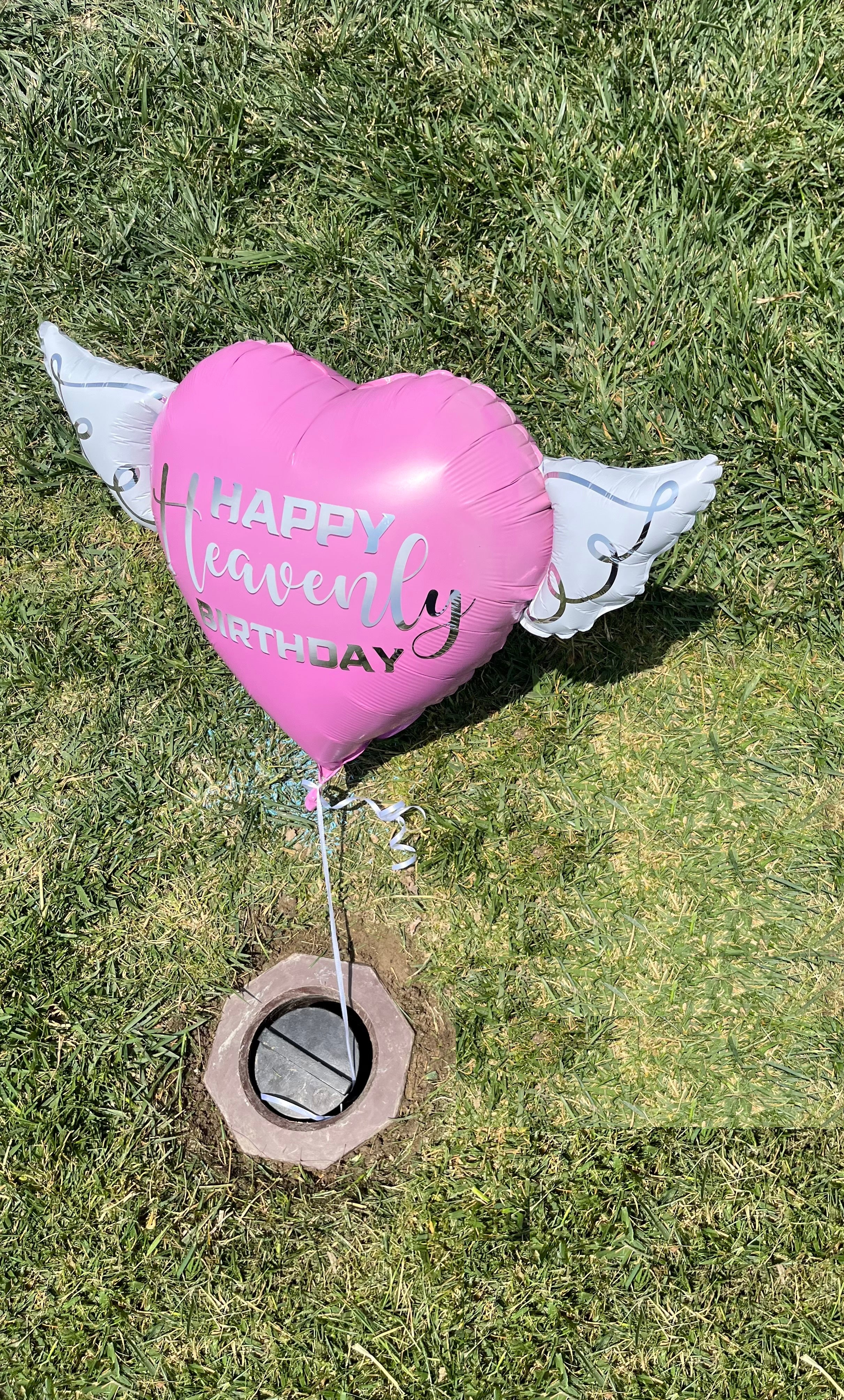 Heart-Shaped Pink Happy Heavenly Birthday Balloon with white angel wings