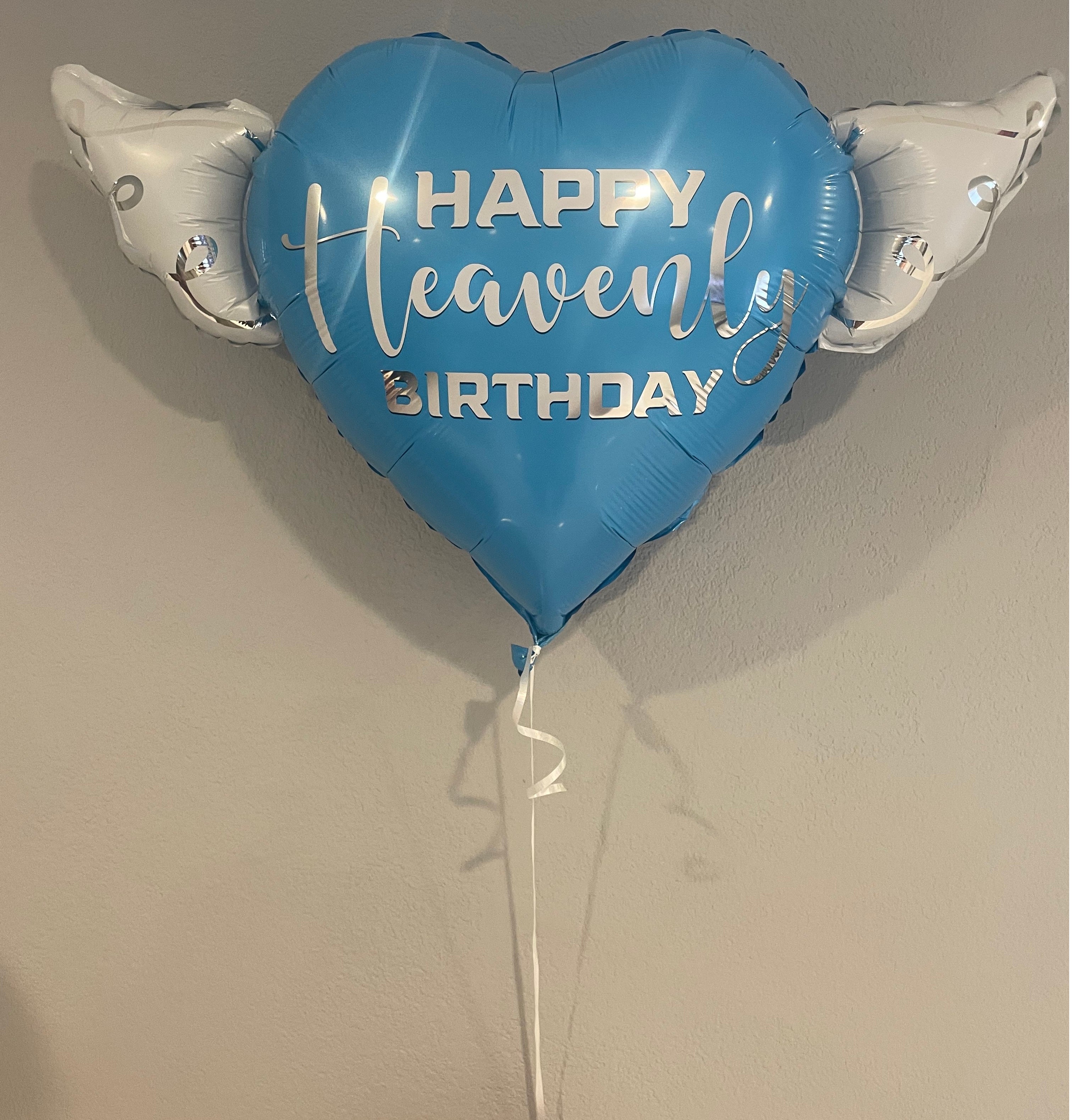 Heart-Shaped Blue Happy Heavenly Birthday Balloon with white angel wings