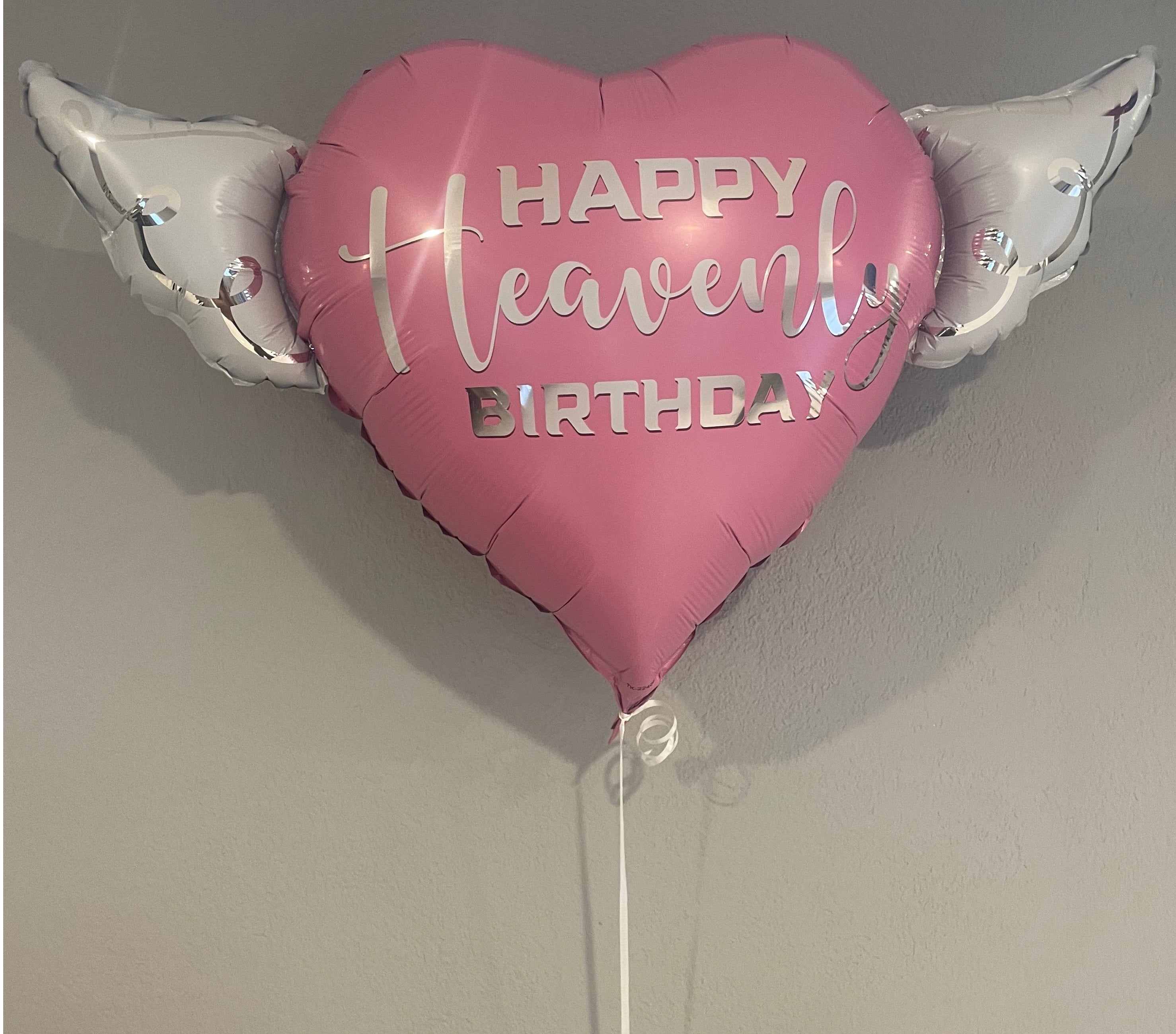 Heart-Shaped Pink Happy Heavenly Birthday Balloon with white angel wings