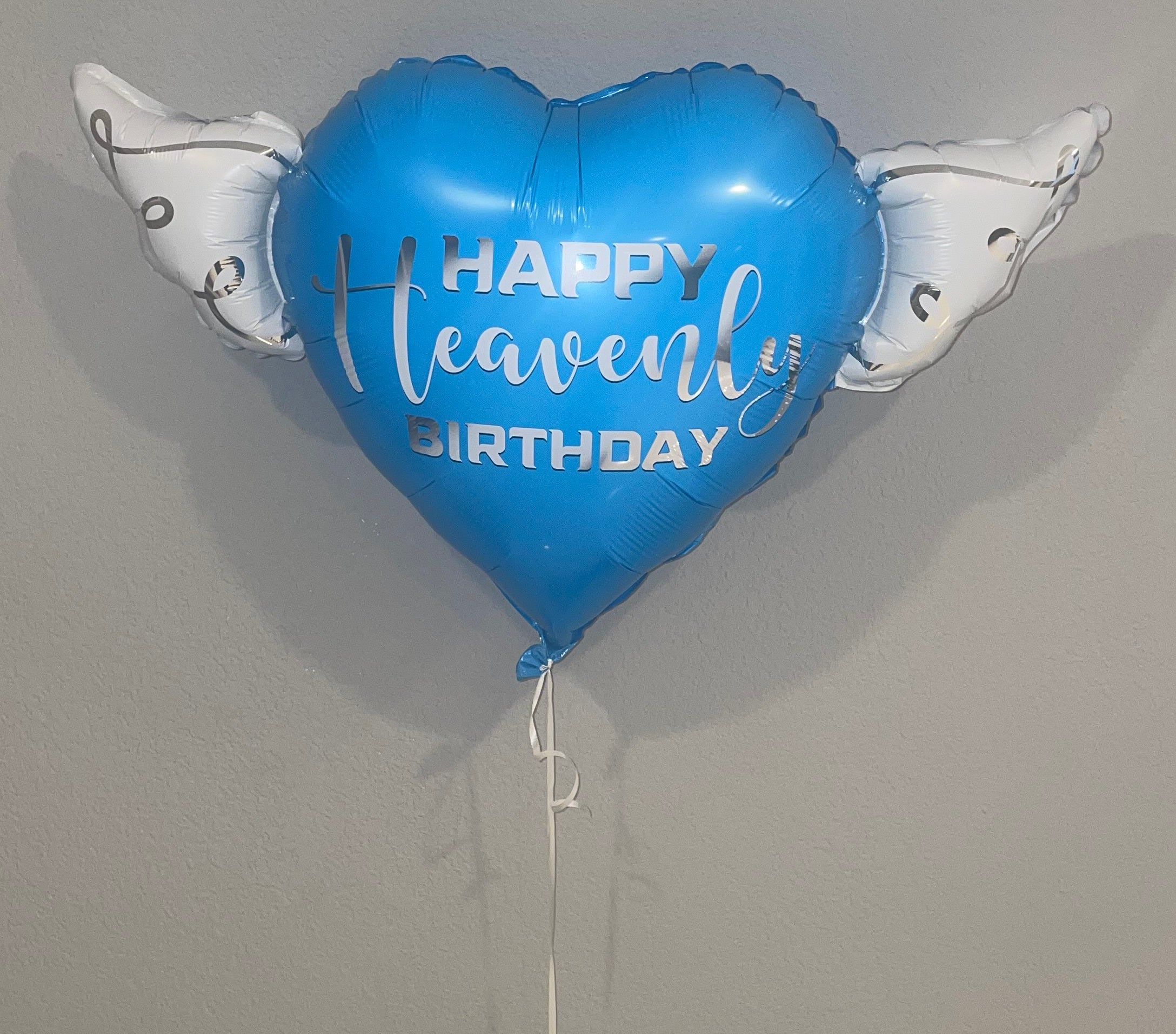 Heart-Shaped Blue Happy Heavenly Birthday Balloon with white angel wings